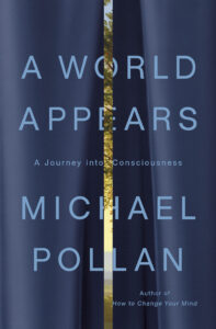 Book cover for "A World Appears" by Michael Pollan. The title and author name is listed on a navy blue curtain, slightly parted in the middle to reveal a landscape.