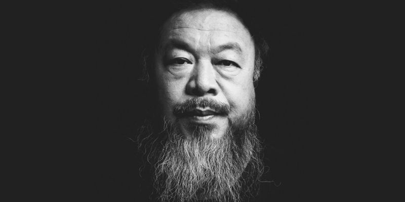 Black and white photos of artist Ai WeiWei with a long greying beard and shaved head.