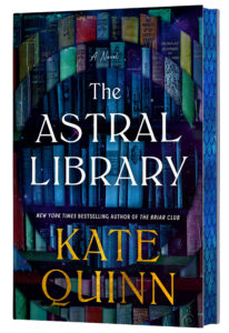 Book cover for "Astral Library" by Kate Quinn, featuring an array of book spines in shades of blue, green, and purple, each with intricate detailing on their covers. The title, "The Astral Library," is displayed in large white text over the center of the image. Above the title, the words "A Novel" are written in small white cursive.
