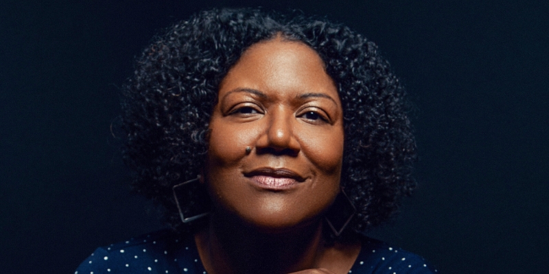 Headshot of Honoree Fannone Jeffers (with dark skin and chin length curly black hair)