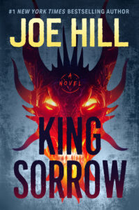 Book cover for "King Sorrow: A Novel" by Joe Hill, featuring an illustration of a fire-breathing dragon head with glowing eyes over a dark grey background.