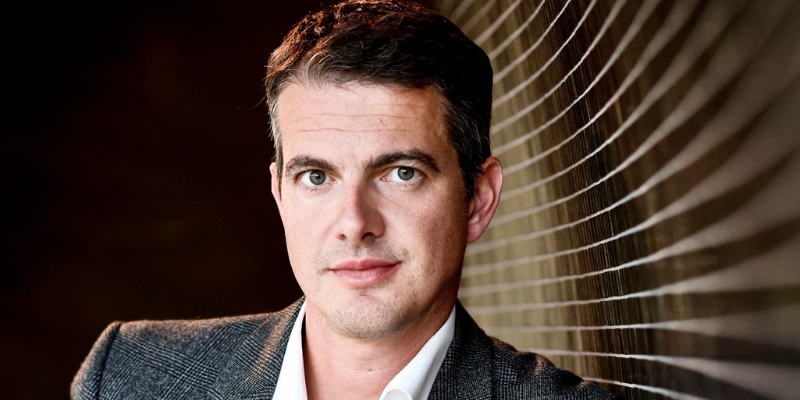 Headshot of Philippe Jaroussky (with fair skin, short brown hair, and grey suit jacket)