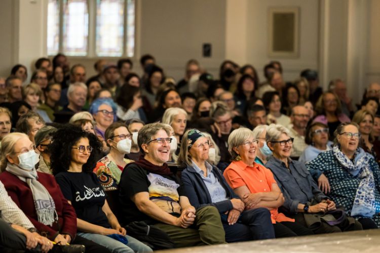 The Town Hall audience laughs along with Rebecca Solnit